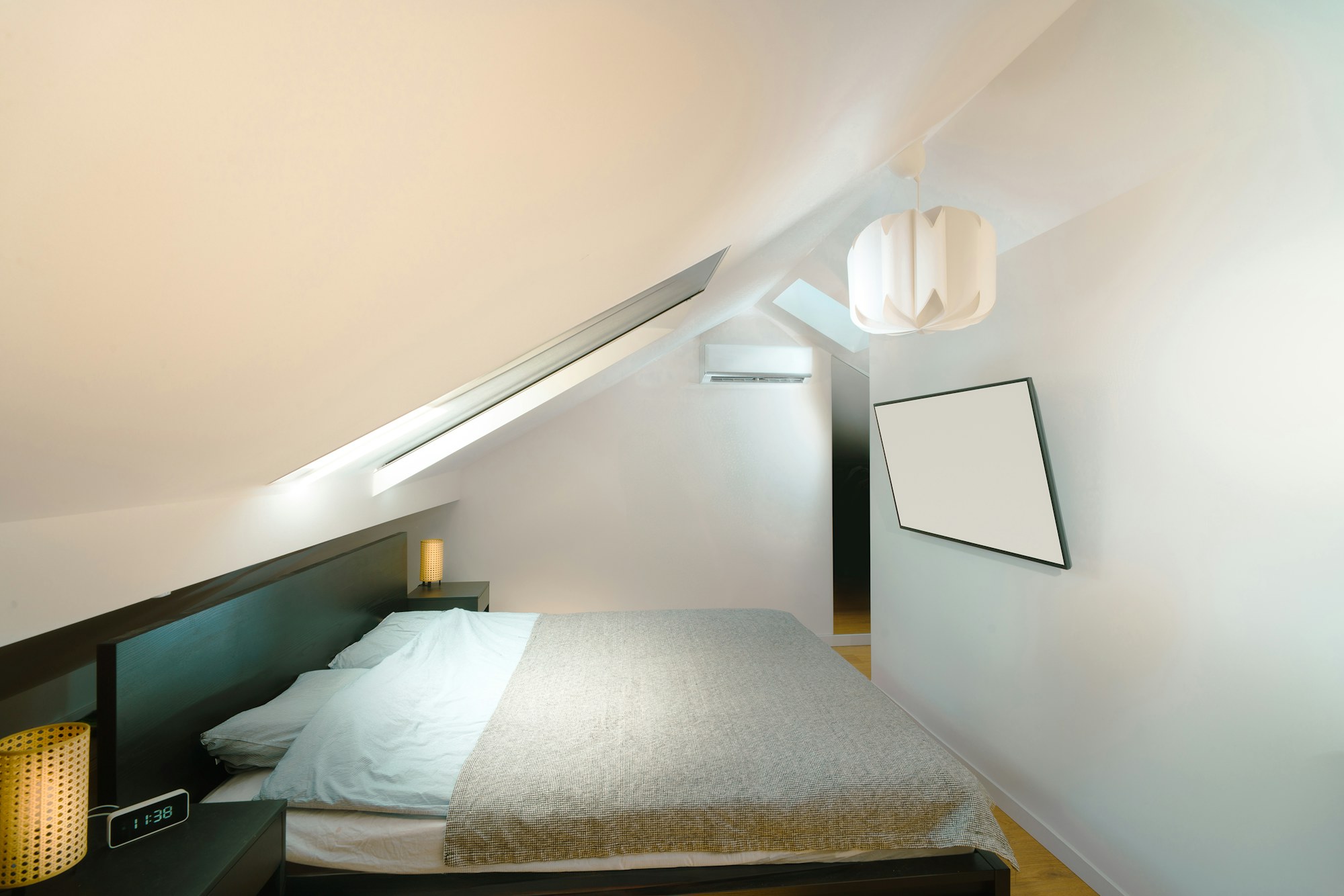 A bedroom and bathroom in the roof